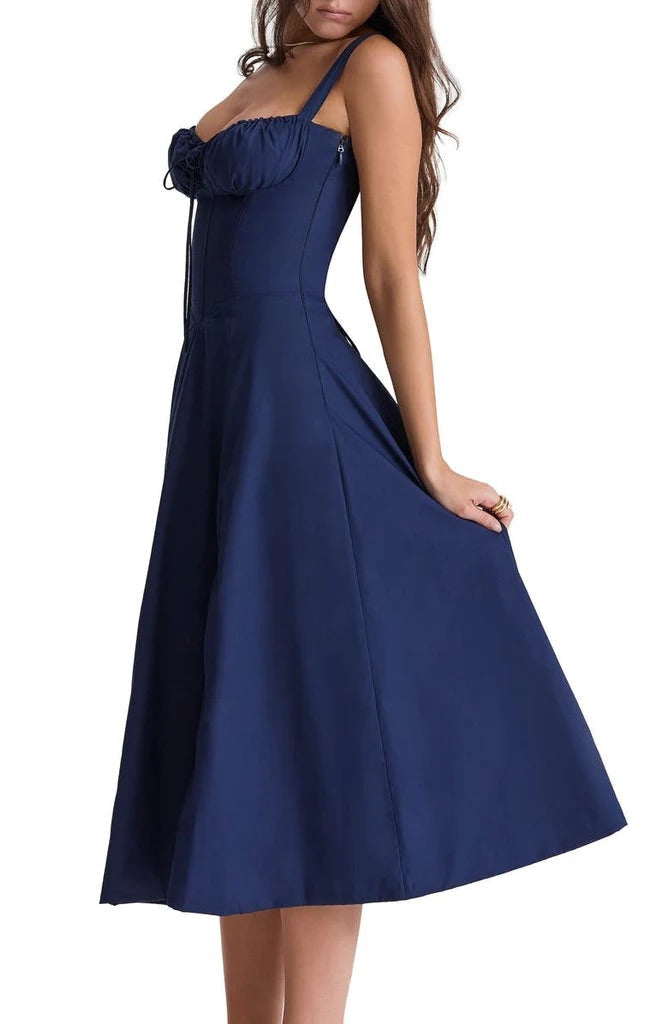 Sleeveless women's floral maxi dress with a sweetheart neckline, defined waist, and stylish side slit.