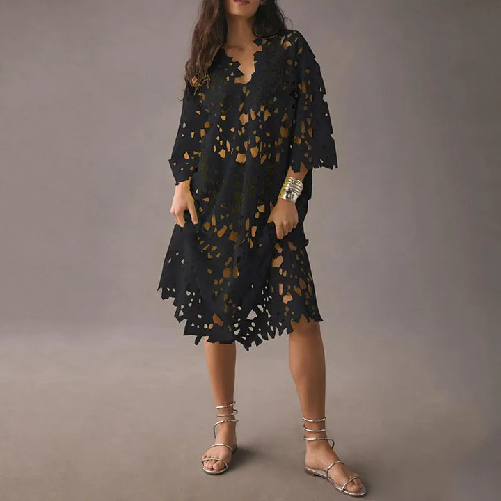 Lightweight floral midi dress for women featuring eyelet lacing, comfortable summer style