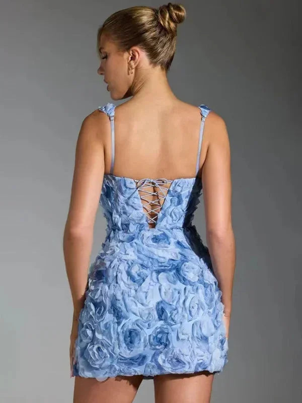 Women's elegant floral textured mini party dress, sleeveless design for special events.