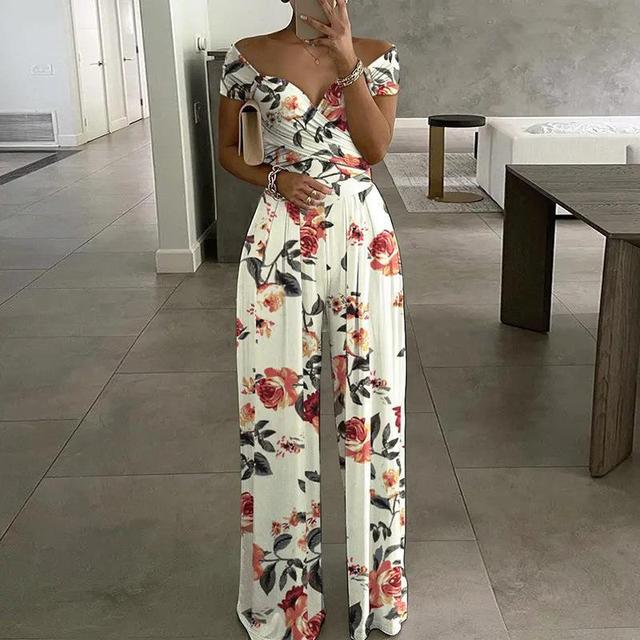 Women's floral off-shoulder wide-leg jumpsuit. Perfect summer outfit for elegant casual wear or vacation.