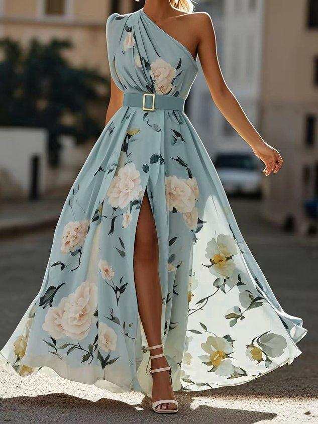 Close-up of elegant women's floral one-shoulder maxi dress, highlighting ruched waist, A-line cut & vibrant print.