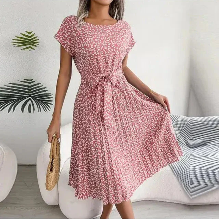 Versatile women's floral pleated midi dress, suitable for casual wear or special occasions.