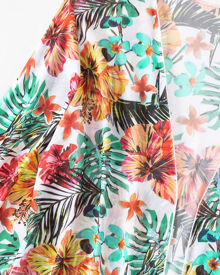Stylish women's floral bikini with matching wrap skirt. Ideal 3-piece swimwear for summer & poolside.