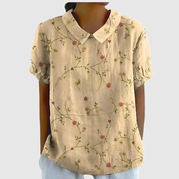 Versatile women's floral print collared blouse. Perfect for summer casual or office fashion.