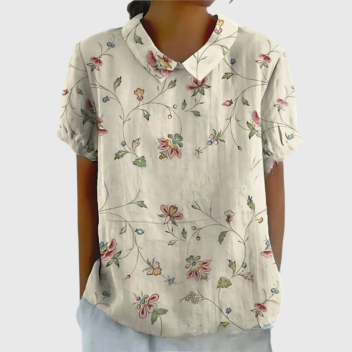 Comfortable short sleeve floral collared top for women. Ideal for summer style and warm weather.