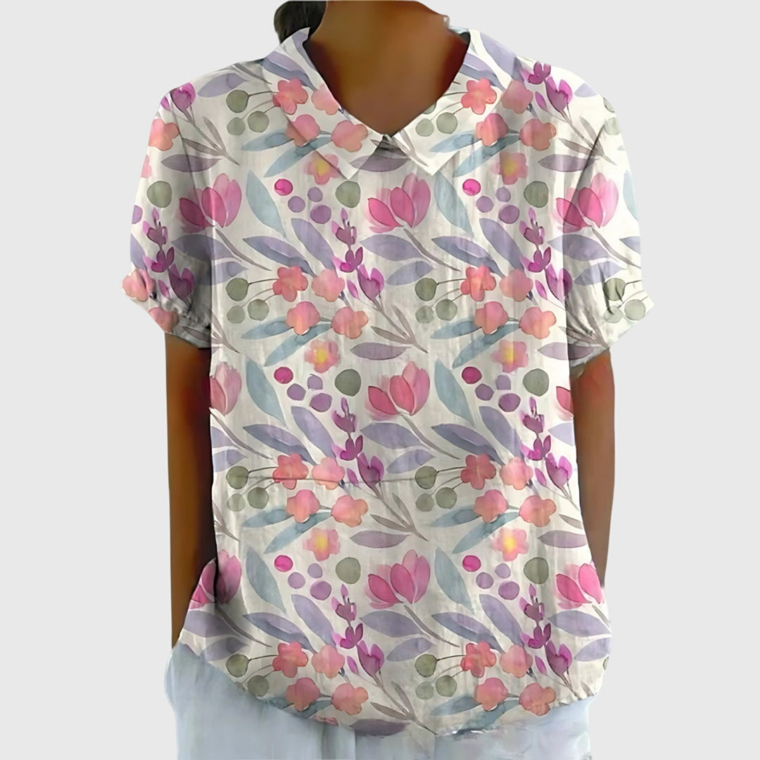Women's floral print collared blouse styled with jeans. Effortless casual chic summer outfit.