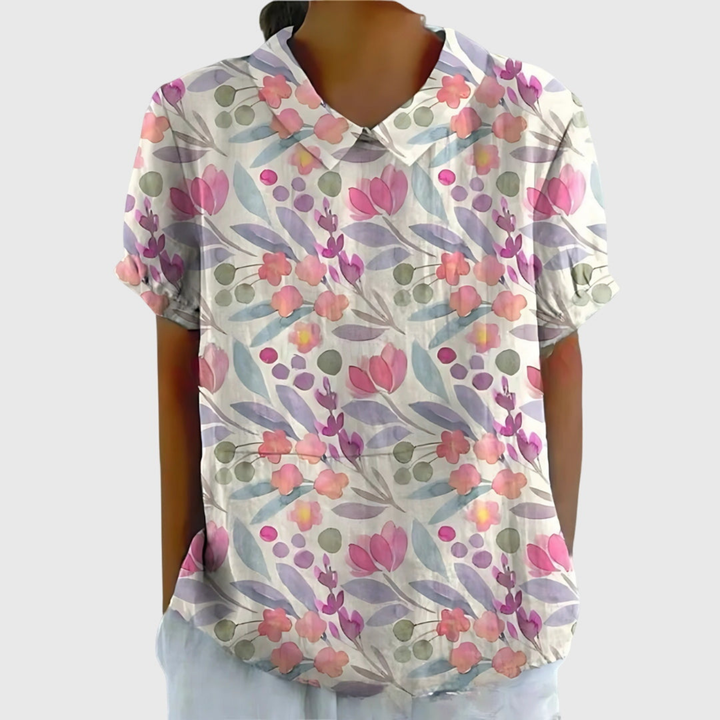 Women's floral print collared blouse styled with jeans. Effortless casual chic summer outfit.
