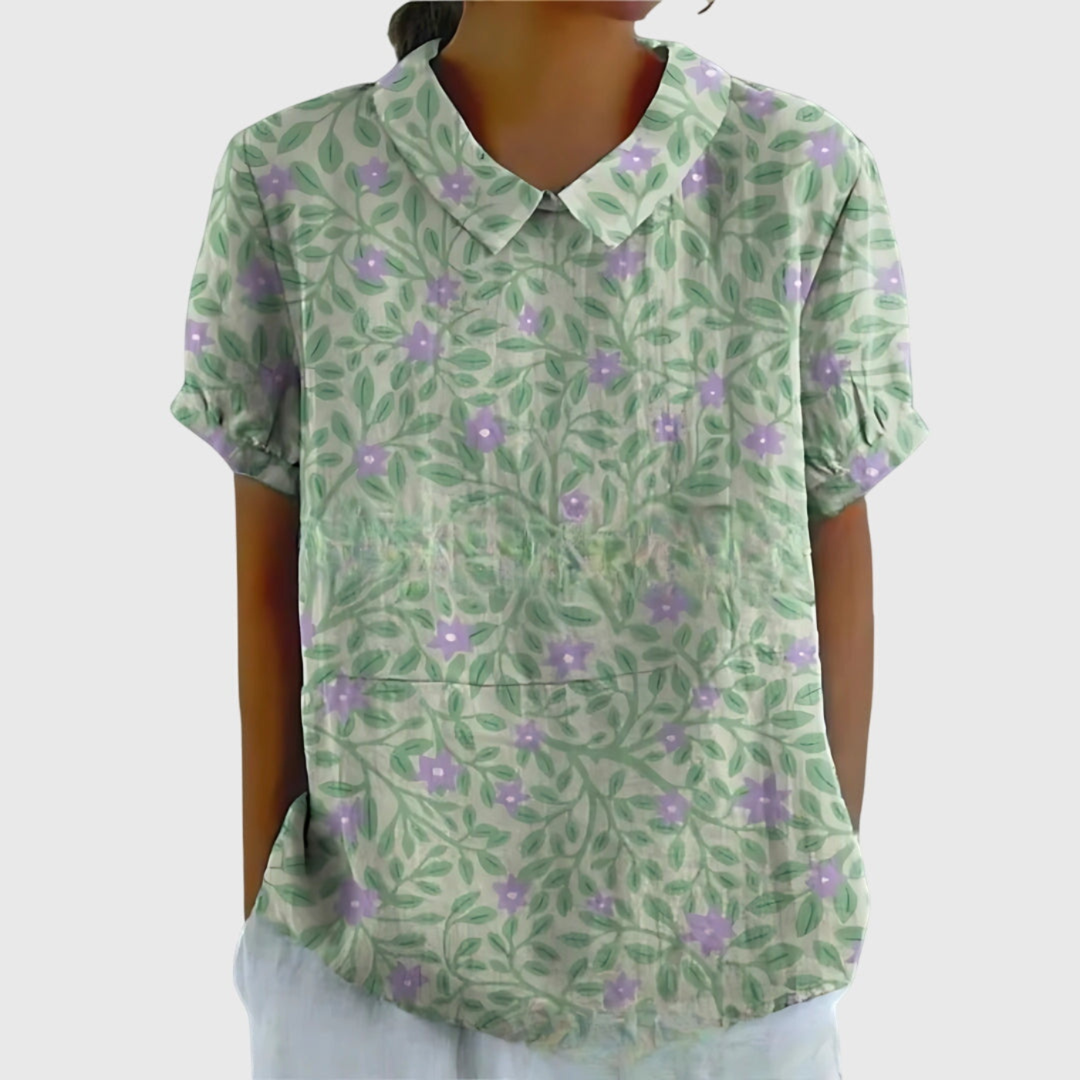 Folded short sleeve floral print blouse. Easy-care, comfortable and patterned summer fashion.