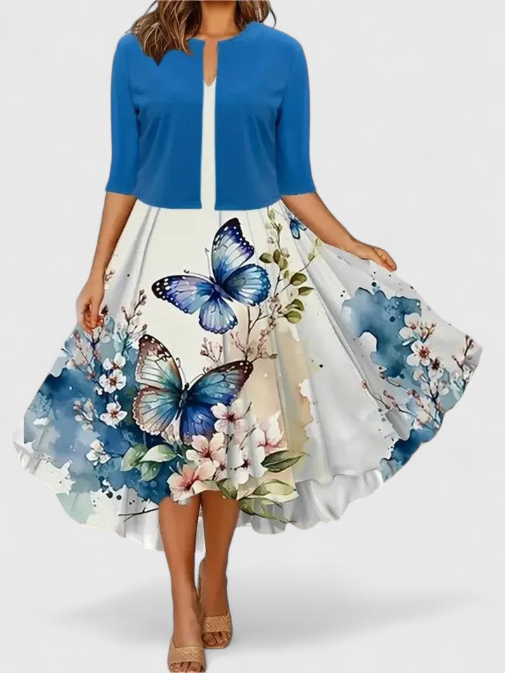 Spring/Summer women's floral print colorblock A-line midi dress with notch neck and three-quarter sleeves.