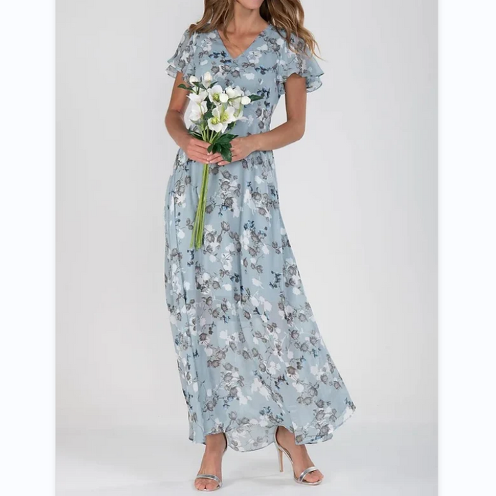 Elegant A-line floral maxi dress for women, featuring flutter sleeves & a V-neck. Ideal for vacation & holidays.