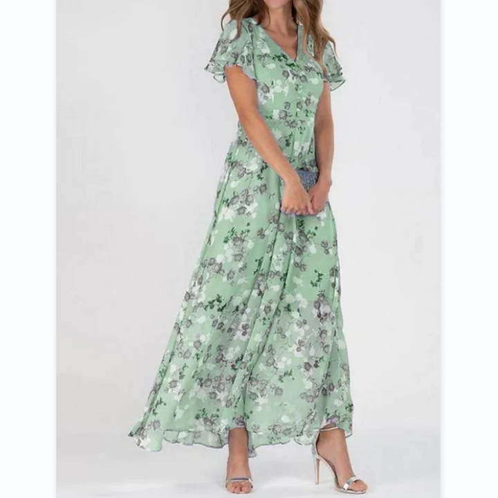 Trendy women's flutter sleeve maxi dress with vibrant floral print. A comfortable & stylish V-neck summer dress.