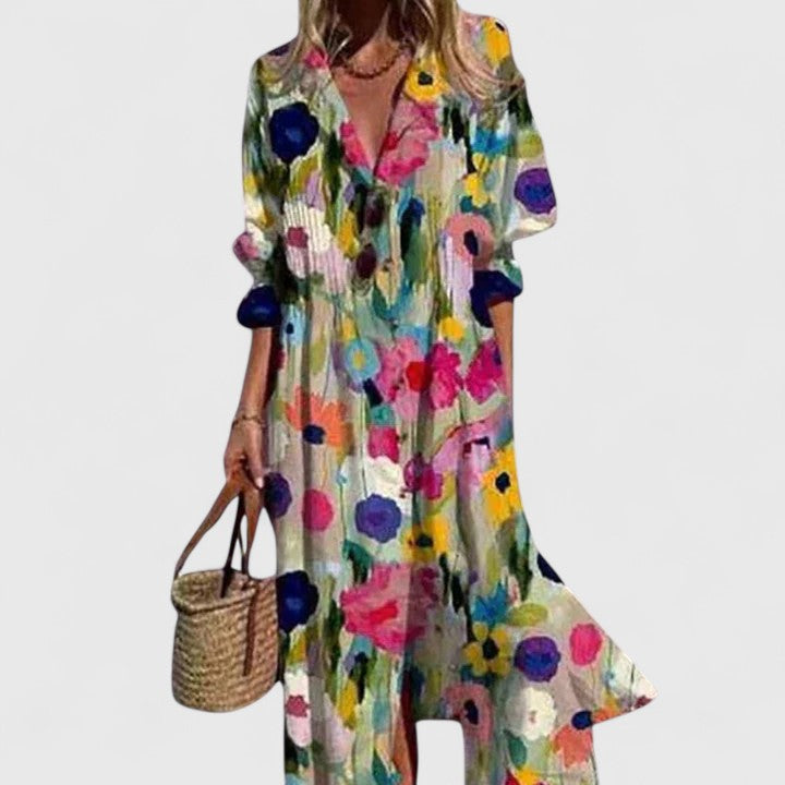 Model in a stylish women's floral print midi shirtdress with pintuck details, ideal for summer fashion.