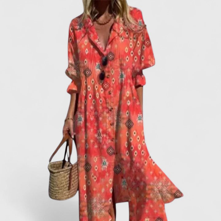Full view of a versatile women's floral print midi shirtdress, featuring pintucks, button-down front, and half sleeves.