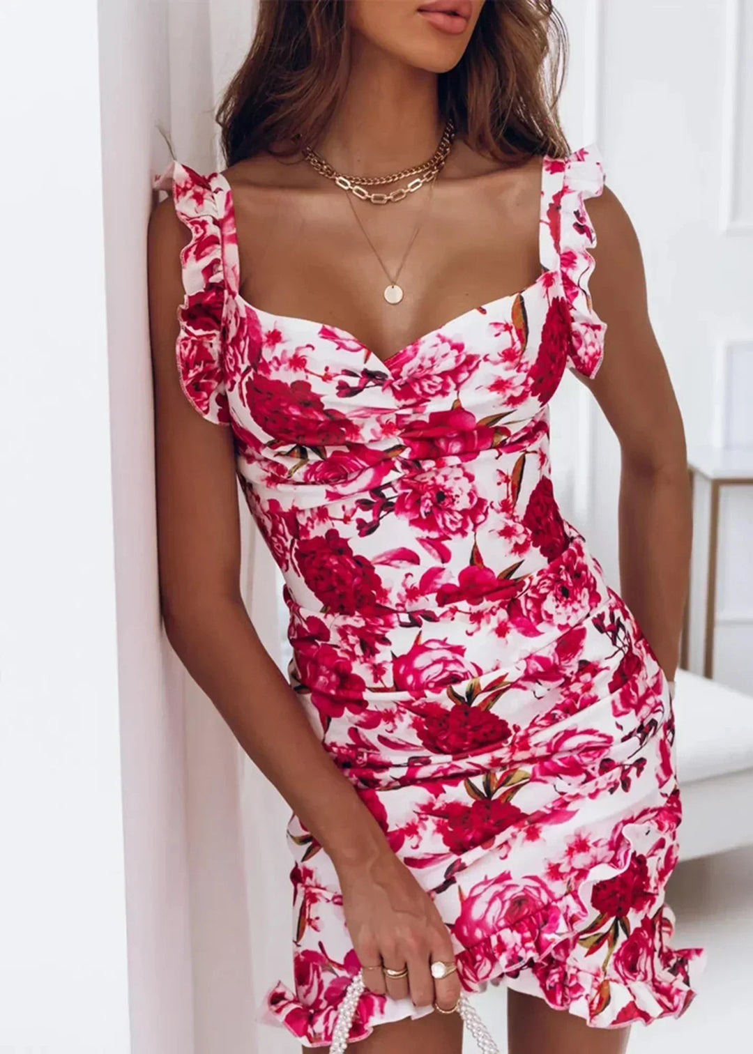Women's fashion: floral print ruffled wrap dress, lightweight and flattering for summer season.