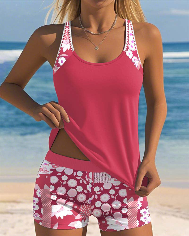 Women's floral print tankini swimsuit with matching swim shorts, perfect for beach comfort.