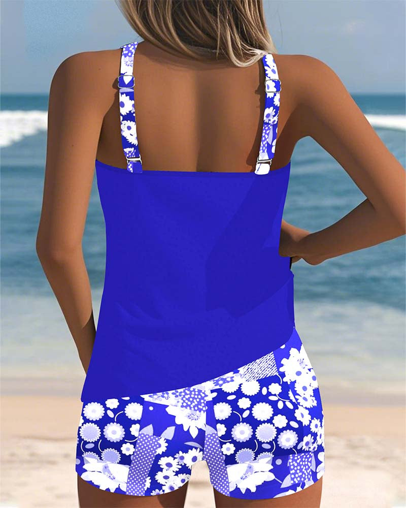 Versatile women's floral tankini swimsuit & swim shorts, a fashionable two-piece beach comfort set.