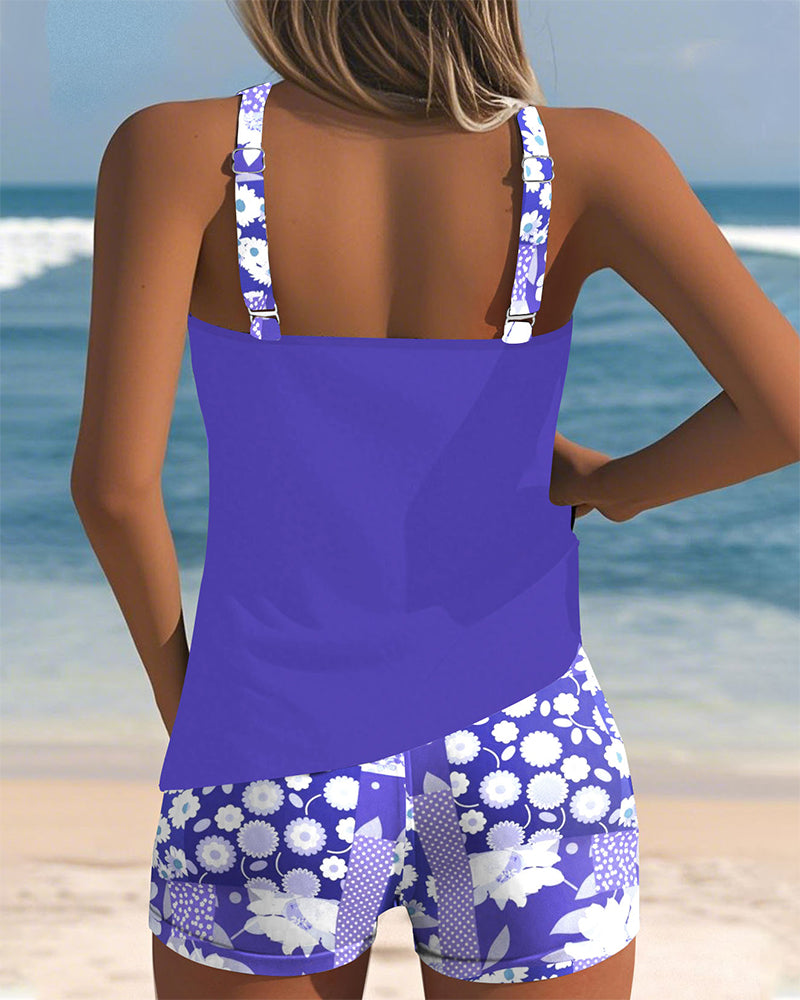 Plus size women's floral tankini swimsuit with swim shorts for stylish beach comfort.