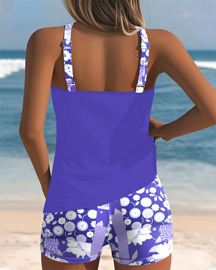 Plus size women's floral tankini swimsuit with swim shorts for stylish beach comfort.