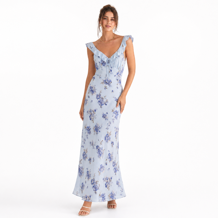 Vibrant floral print women's beach dress, sleeveless & backless design. A must-have for summer fashion.