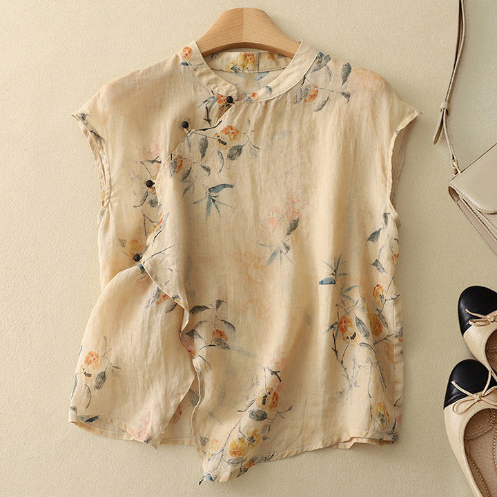 Women's floral sleeveless blouse, perfect for summer. Lightweight & comfortable, featuring a relaxed fit & button placket.