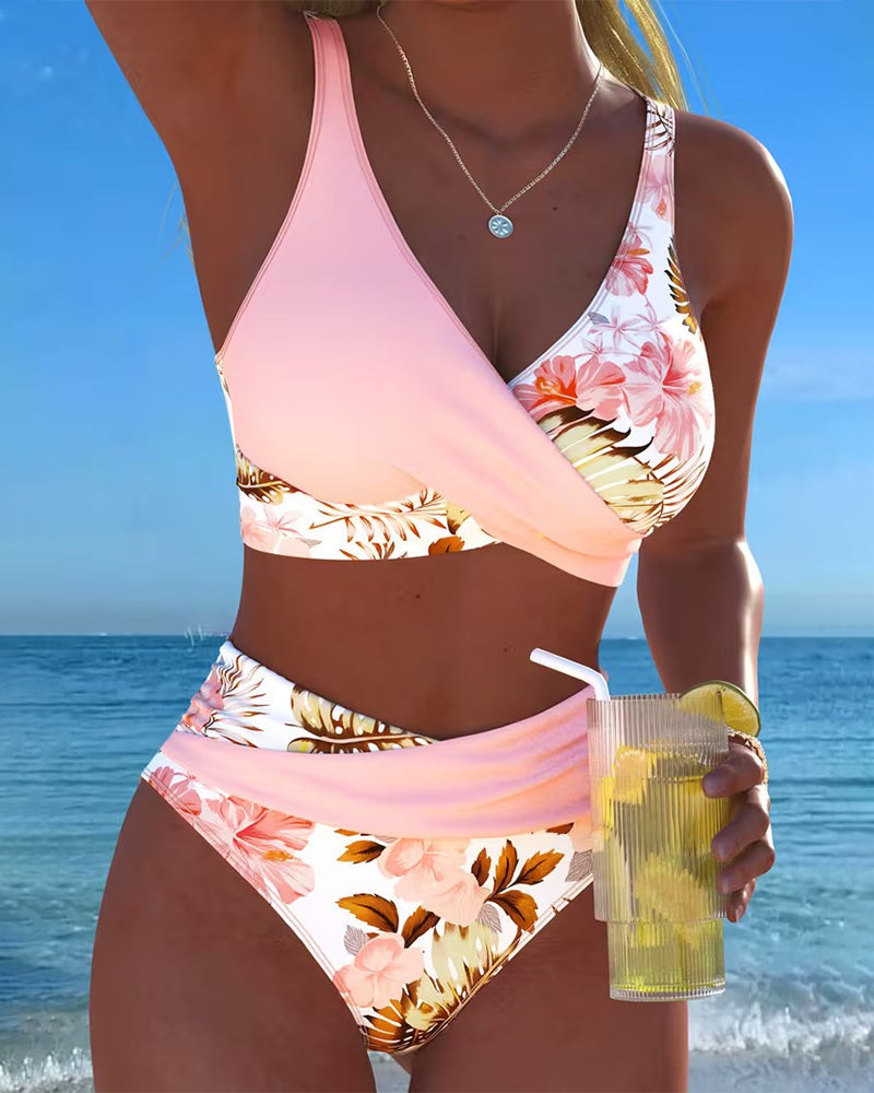 Women's floral split bikini set, two-piece swimwear for stylish beach days & summer fashion.
