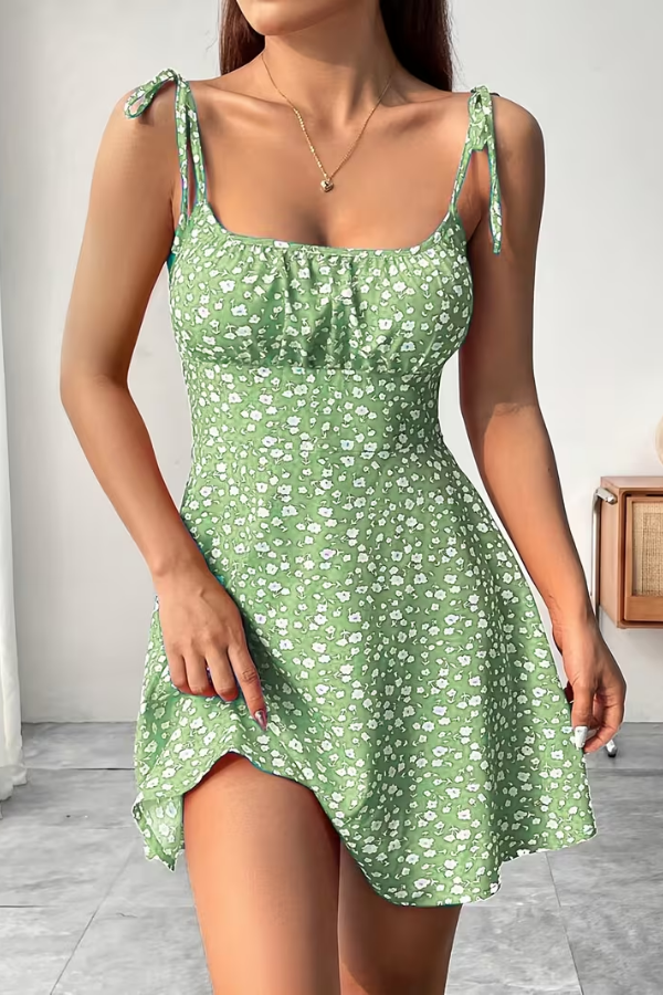 Chic floral print mini slip dress for women. Strapless design, perfect for a night out or vacation.
