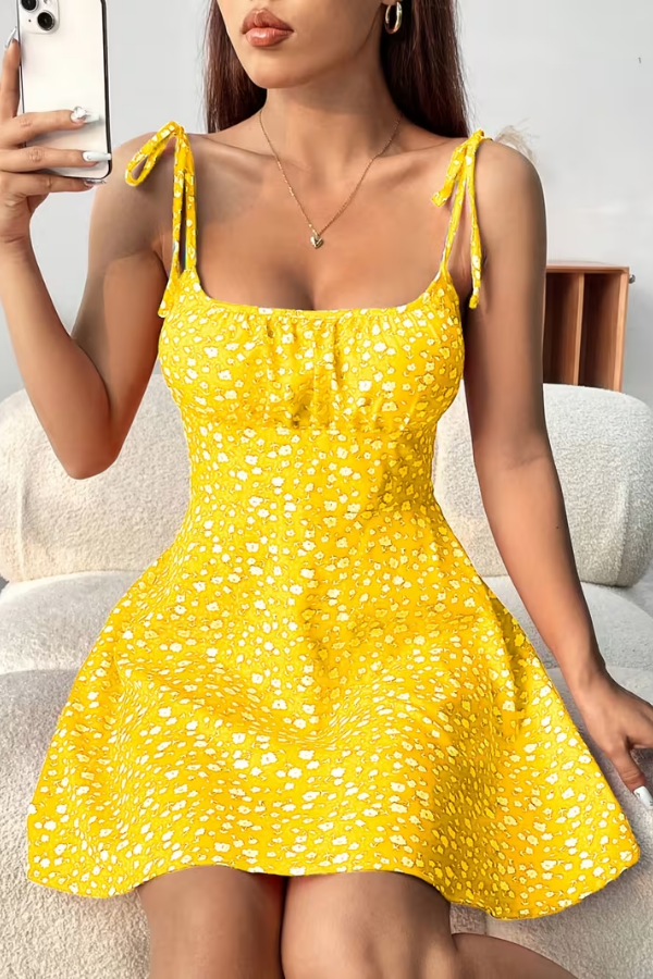 Vibrant floral strapless slip dress. Women's elegant mini dress, versatile for day or night.