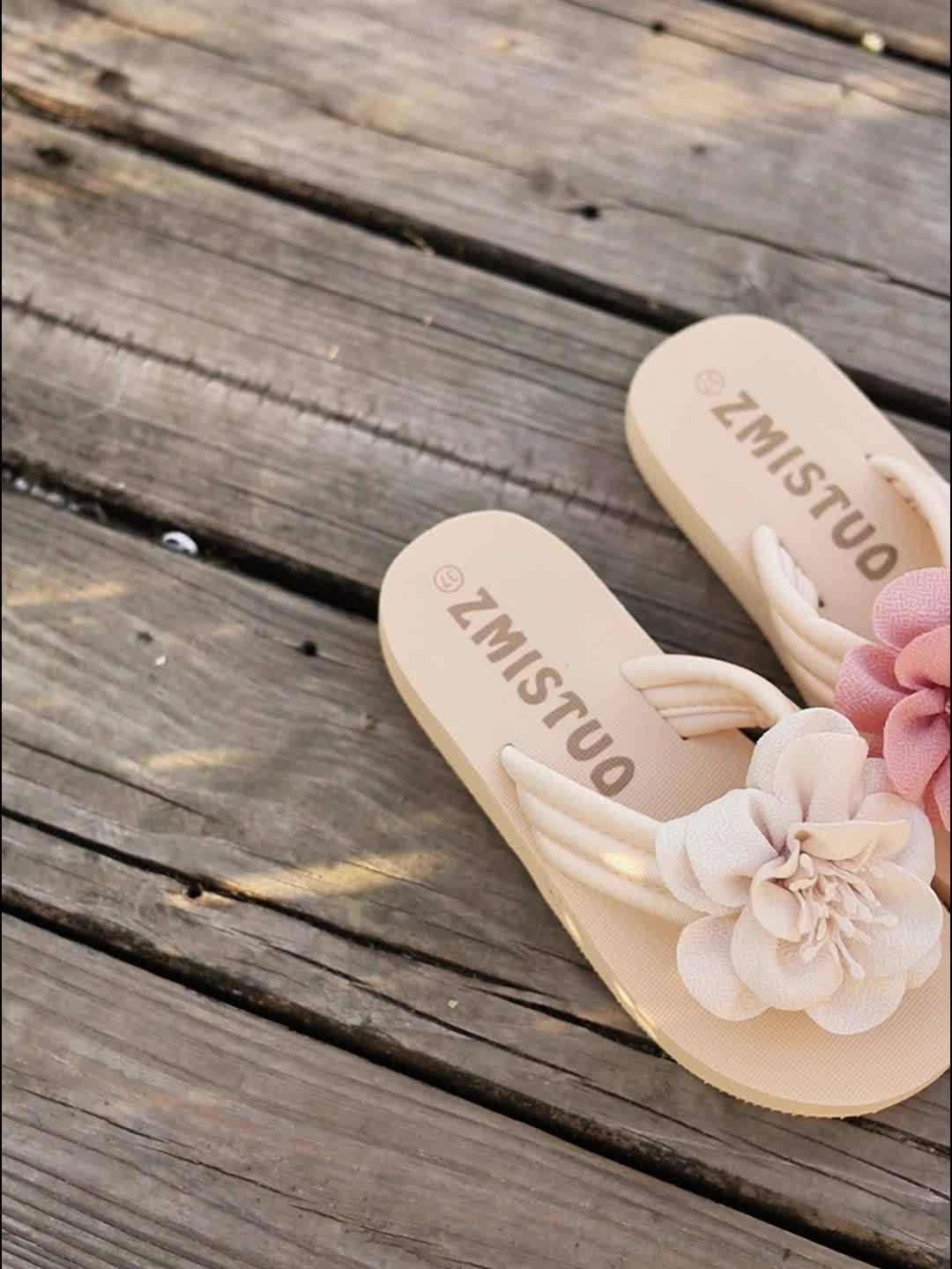 A collection of women's floral summer slippers in various sizes, presented neatly, comfortable, trendy