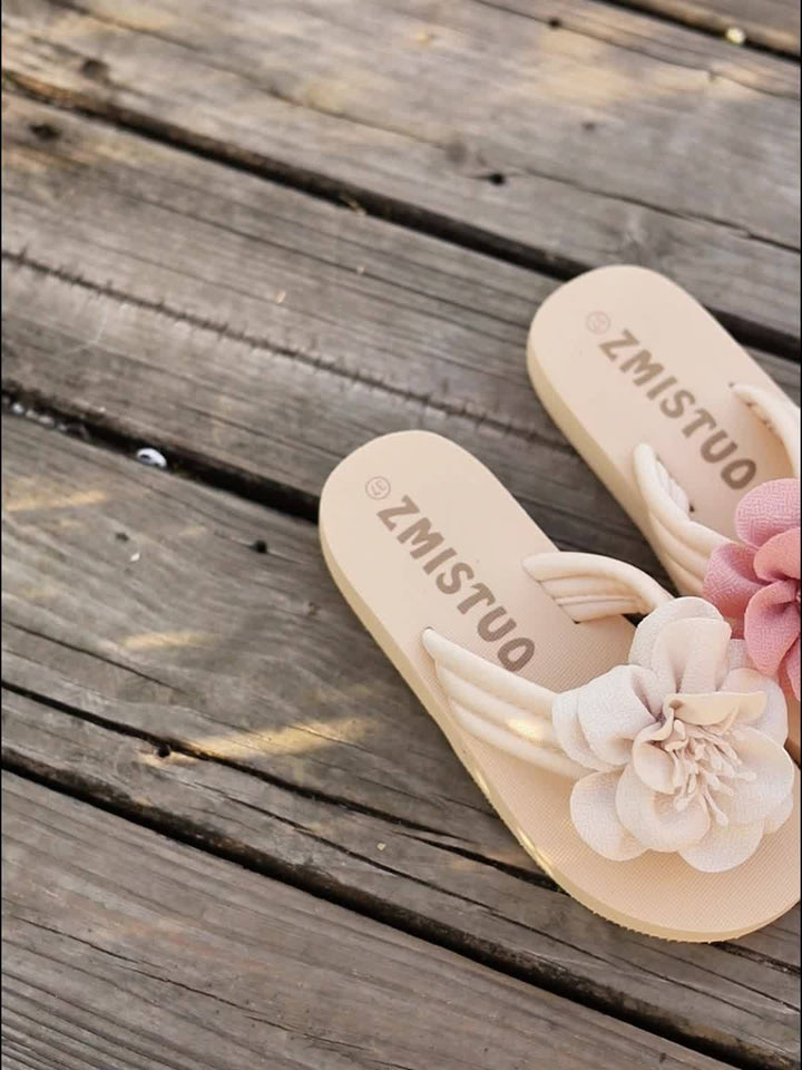 A collection of women's floral summer slippers in various sizes, presented neatly, comfortable, trendy