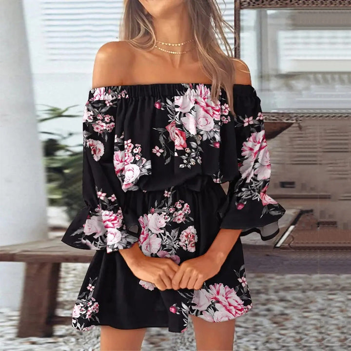 Boho-chic midi dress for women, featuring a vibrant floral print & graceful flared sleeves. Ideal for summer parties.