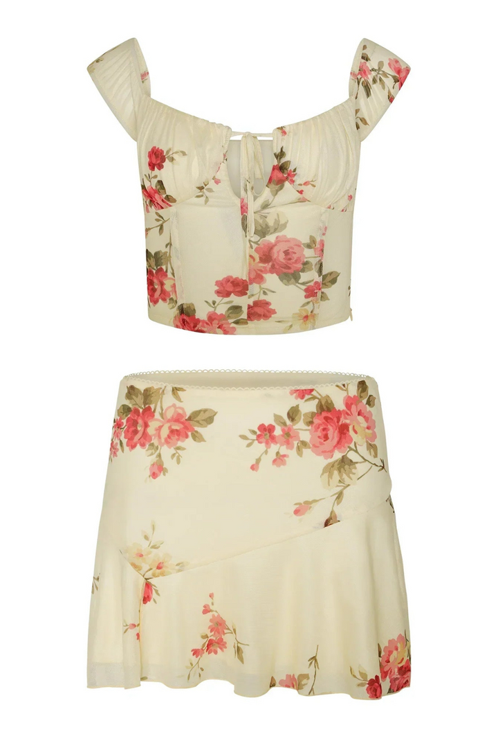 Casual chic women's two-piece floral set, including a bow-detail crop top and a comfortable matching mini skirt.