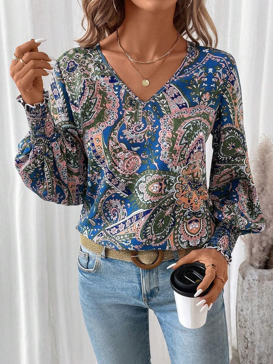Stylish women's floral print V-neck blouse with lantern long sleeves. Ideal for spring/summer casual & elegant wear.