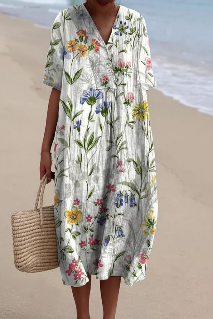 Chic V-neck floral midi dress for women, a comfortable and stylish option for summer casual outings or elegant vacations.