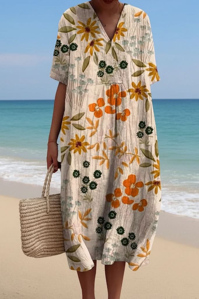Relaxed fit women's floral V-neck midi dress, designed for ultimate summer comfort. Perfect elegant casual vacation dress.