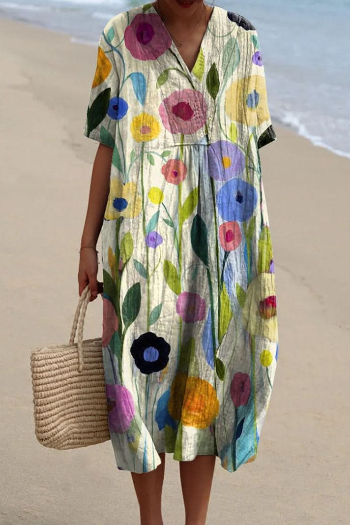 Elegant women's floral V-neck midi dress, a comfortable summer casual dress for vacations & spring fashion.