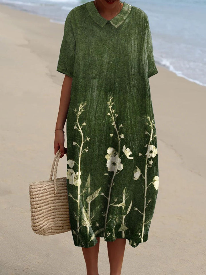 Chic floral V-neck summer dress for women. Light, comfortable & versatile for day wear or elegant garden events.