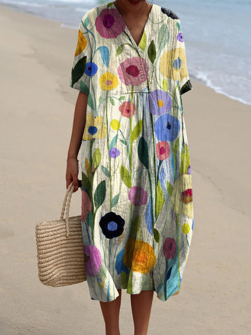 Women's comfortable V-neck summer dress in a delightful floral print. Light, flowy fabric for ultimate ease.