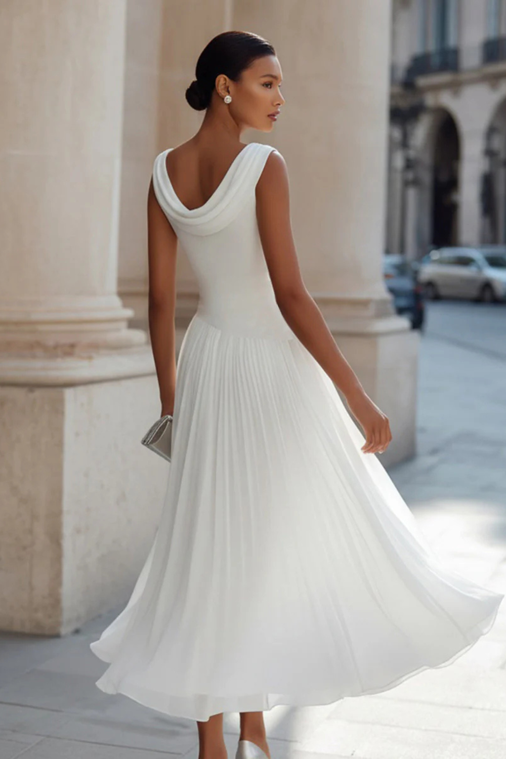 Women's graceful flowing midi dress, sleeveless and A-line, perfect for summer and party wear.
