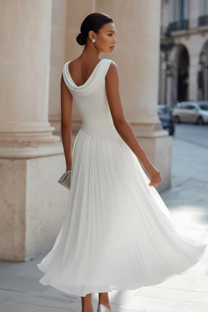 Women's graceful flowing midi dress, sleeveless and A-line, perfect for summer and party wear.