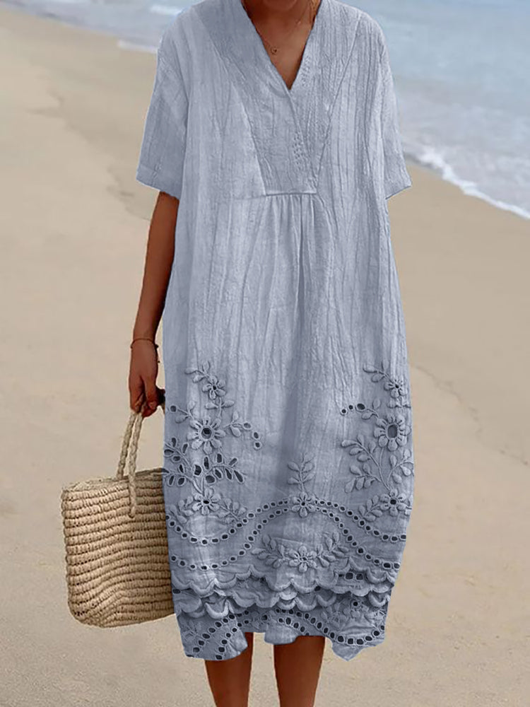 Chic women's midi dress with a flowing, relaxed fit. Versatile for summer, beach, or casual wear. Comfortable bohemian style.