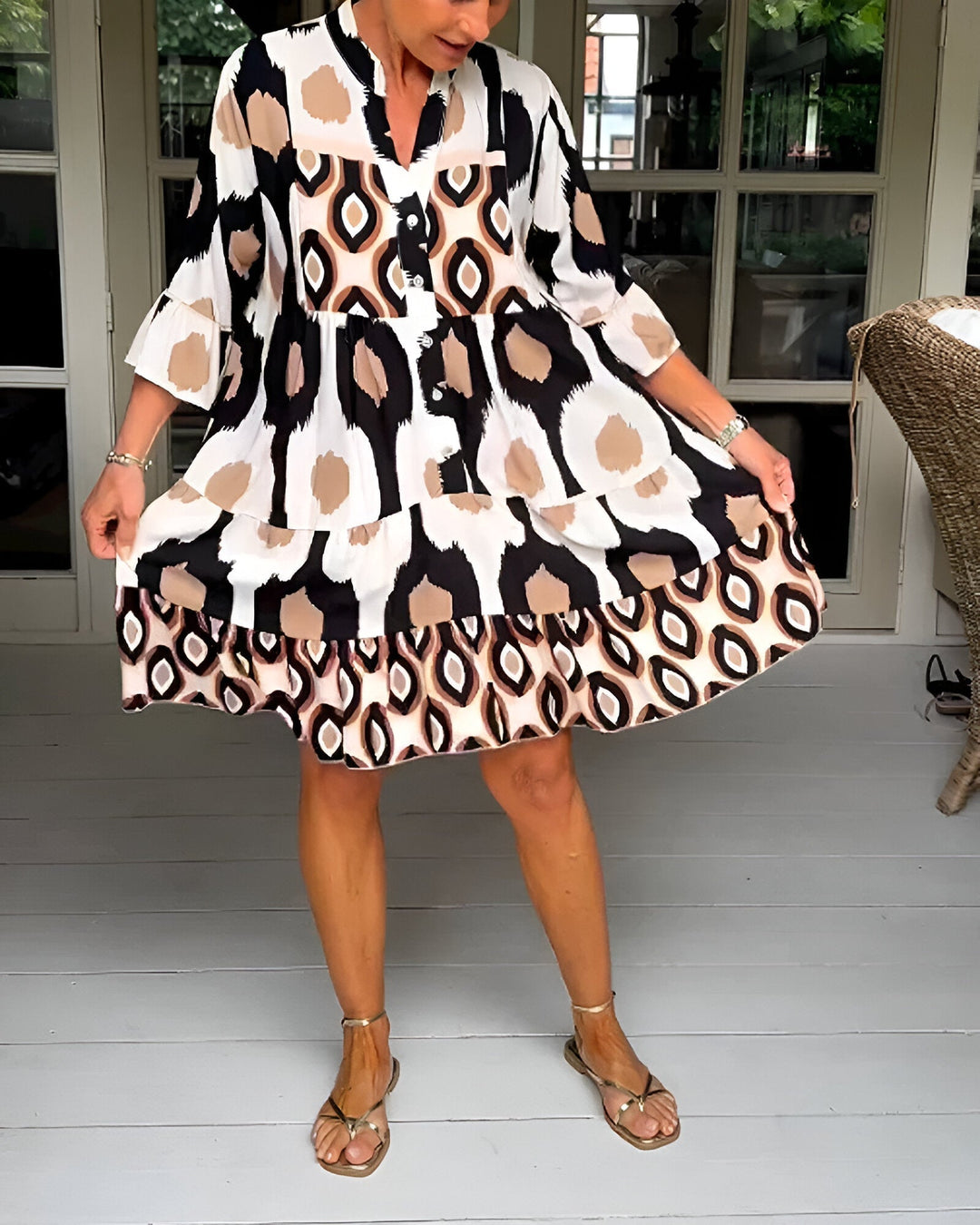 Casual women's A-line bohemian dress featuring a tiered geometric print, ideal for spring & summer wear.