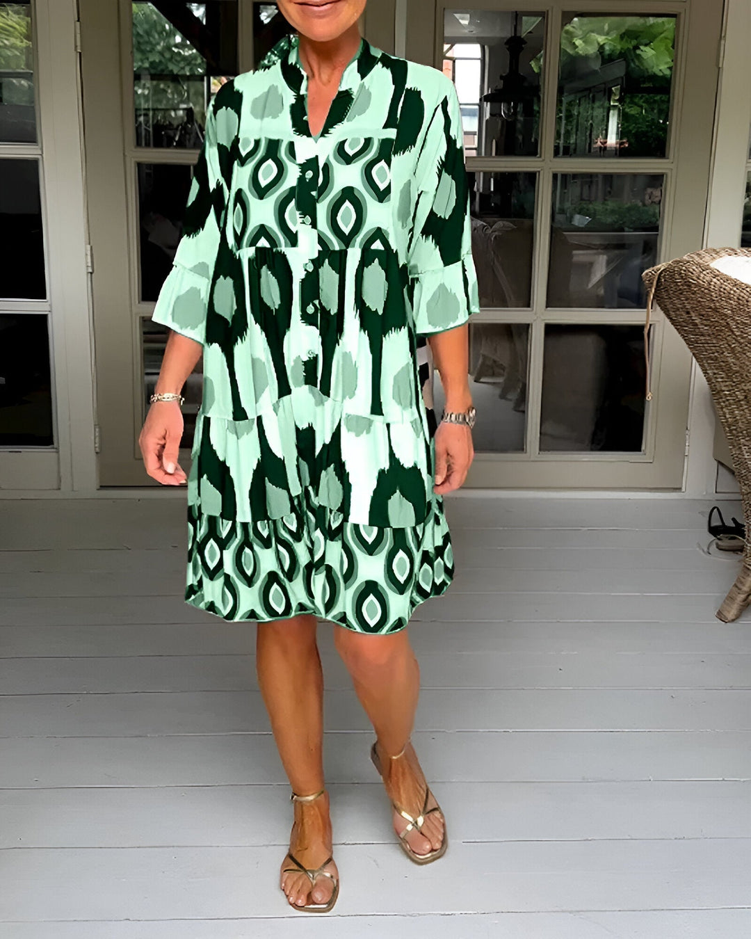 Women's spring bohemian tiered dress showcasing a vibrant geometric print, A-line cut, and comfortable fit.