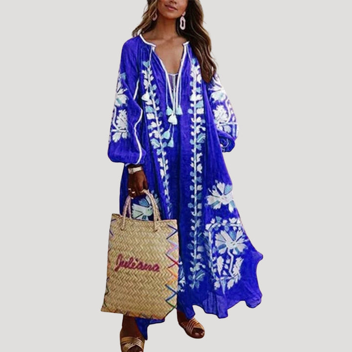 Bohemian long sleeve maxi dress for women, featuring a comfortable flowy fit and elegant V-neck design.