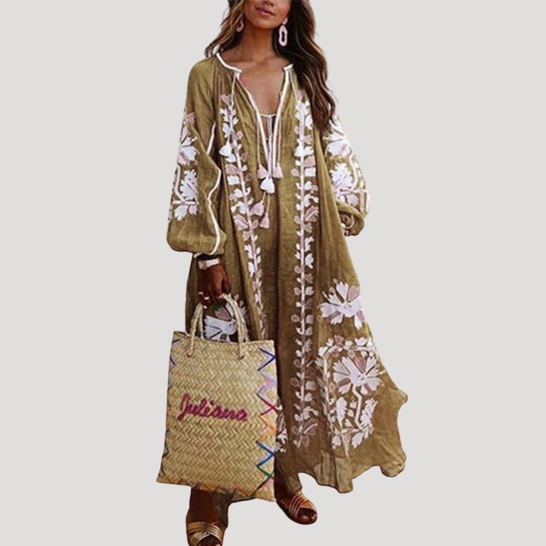 Elegant bohemian women's dress: V-neck, long sleeve, patterned maxi dress with a comfortable, flowy silhouette.