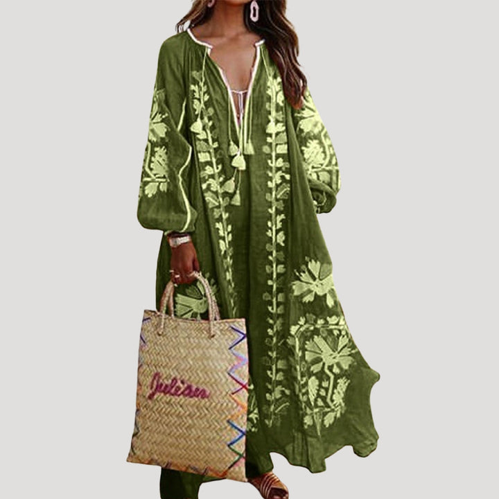 Women's spring/summer flowy maxi dress, featuring a chic V-neck, long sleeves, and unique bohemian print.