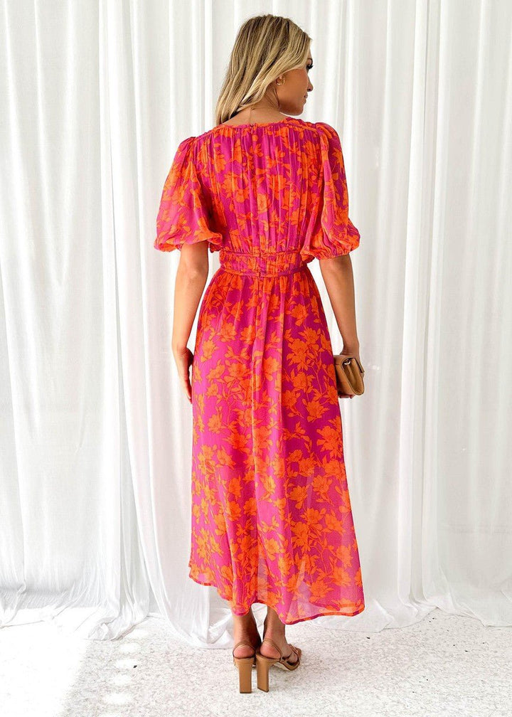 Comfortable pink orange floral maxi dress with puff sleeves & V-neck, a flowing women's summer vacation or brunch outfit.