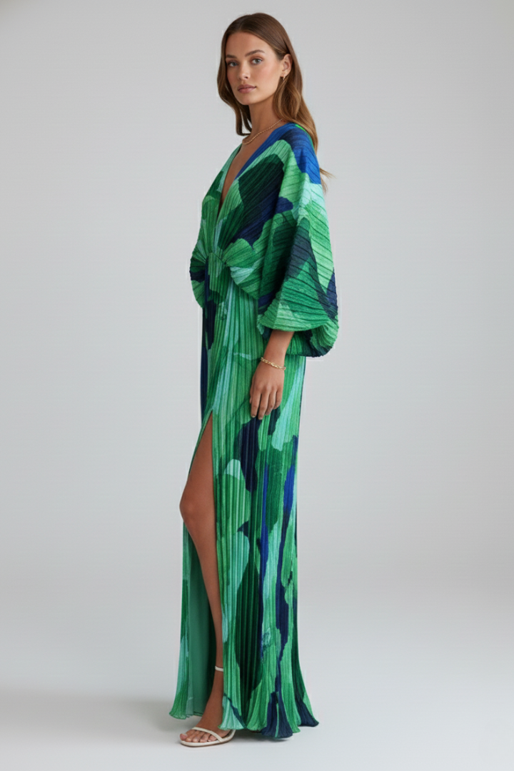 Stylish women's maxi dress, featuring a flattering V-neck, elegant pleats, and a chic side slit for a sophisticated look.