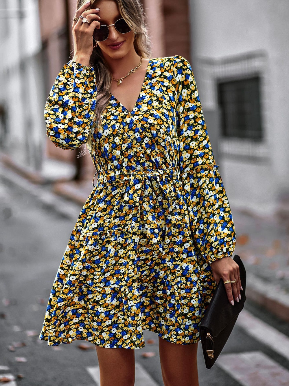 Elegant women's belted ruffle mini dress. Flowing design, perfect for summer parties, casual outings, or vacation.