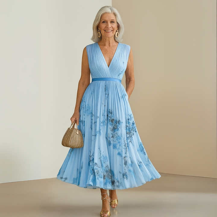 Effortless flowing sleeveless maxi dress for women, lightweight design perfect for graceful movement & summer.