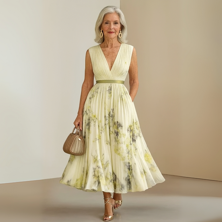 Chic V-neck sleeveless maxi dress for women, flowing silhouette and lightweight fabric for elegant spring wear.